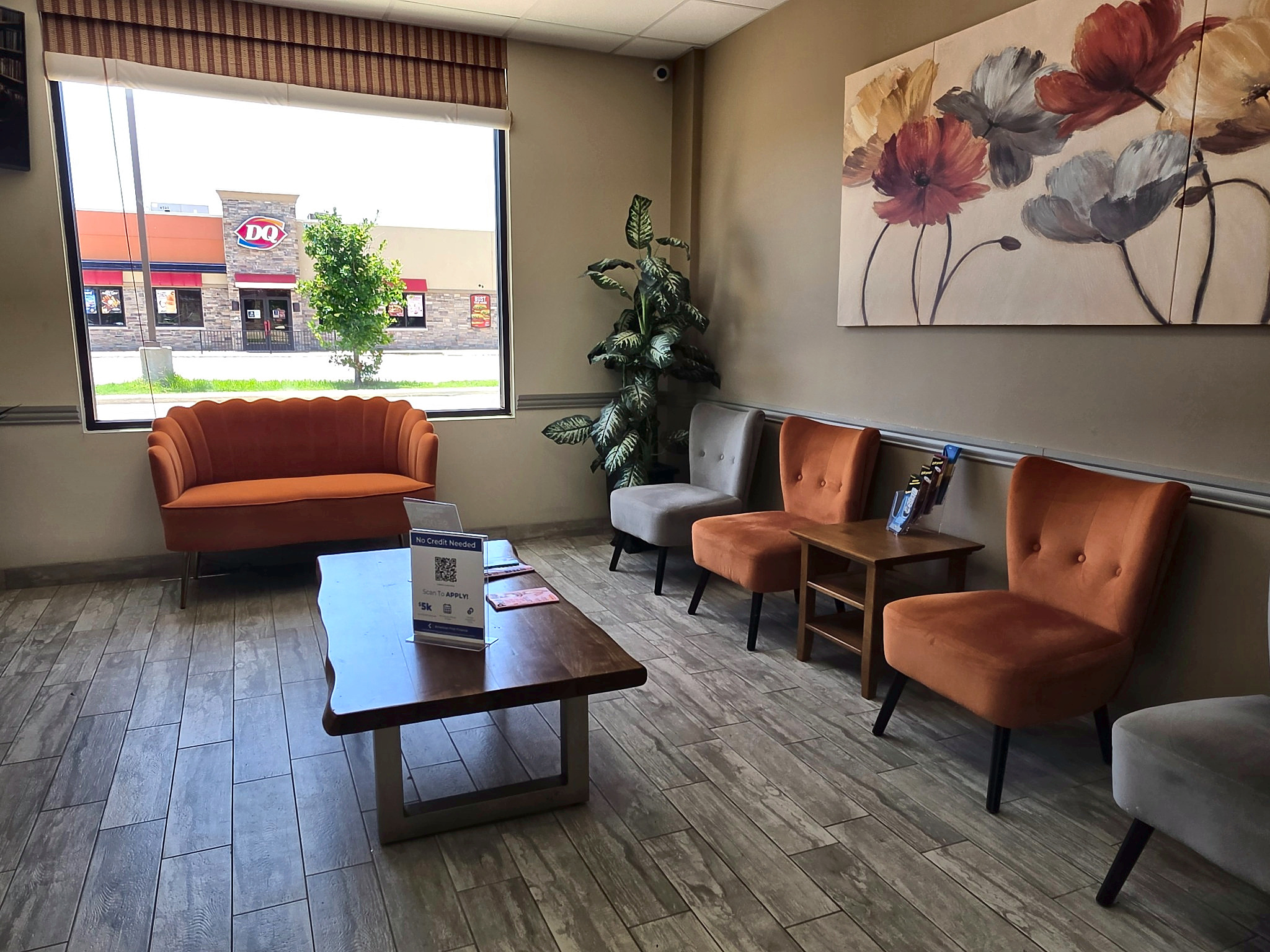 Comfortable waiting room with seating at Auto Care USA in Katy, TX