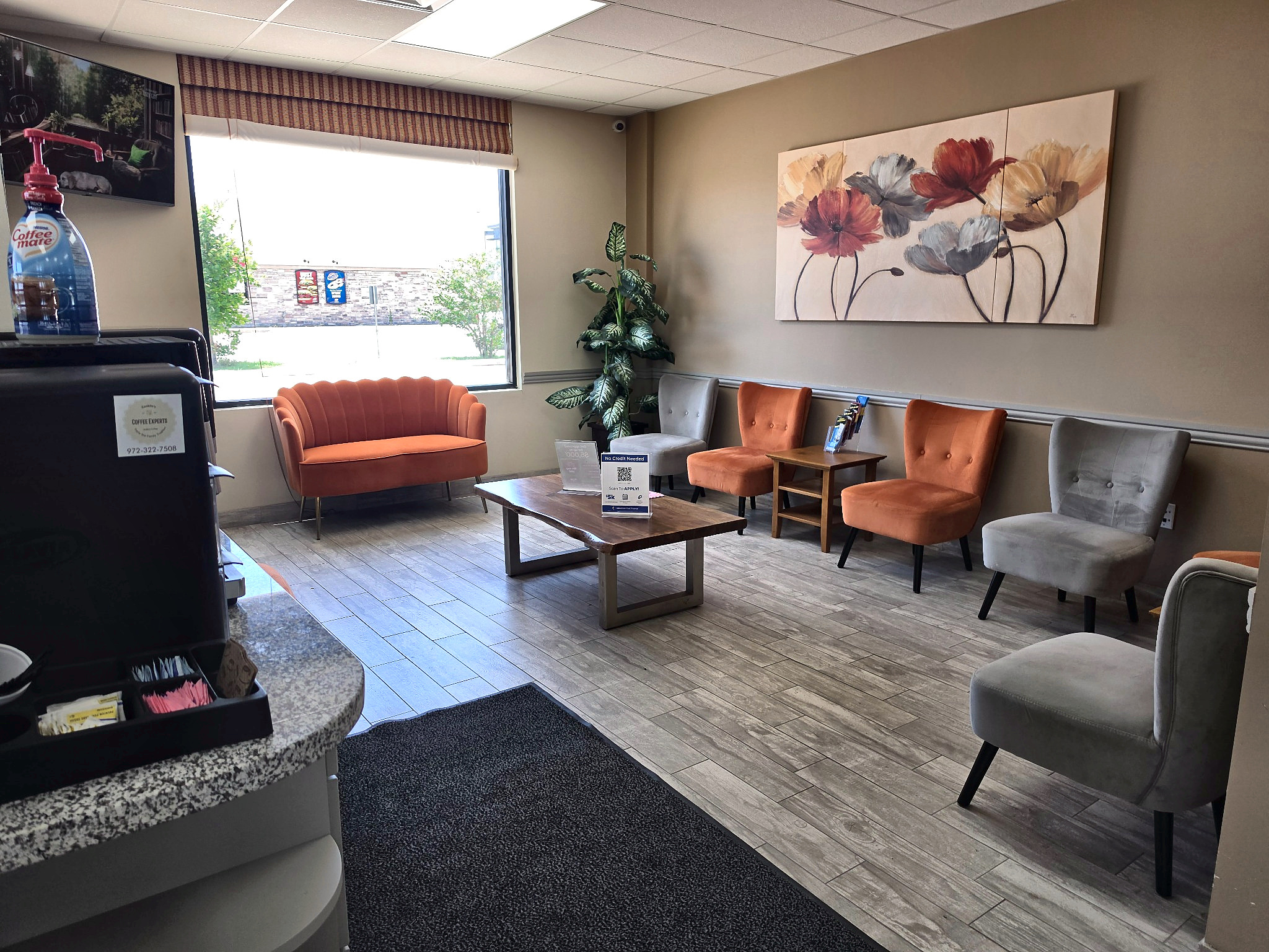 Customer waiting area seating at Auto Care USA auto repair in Katy, TX