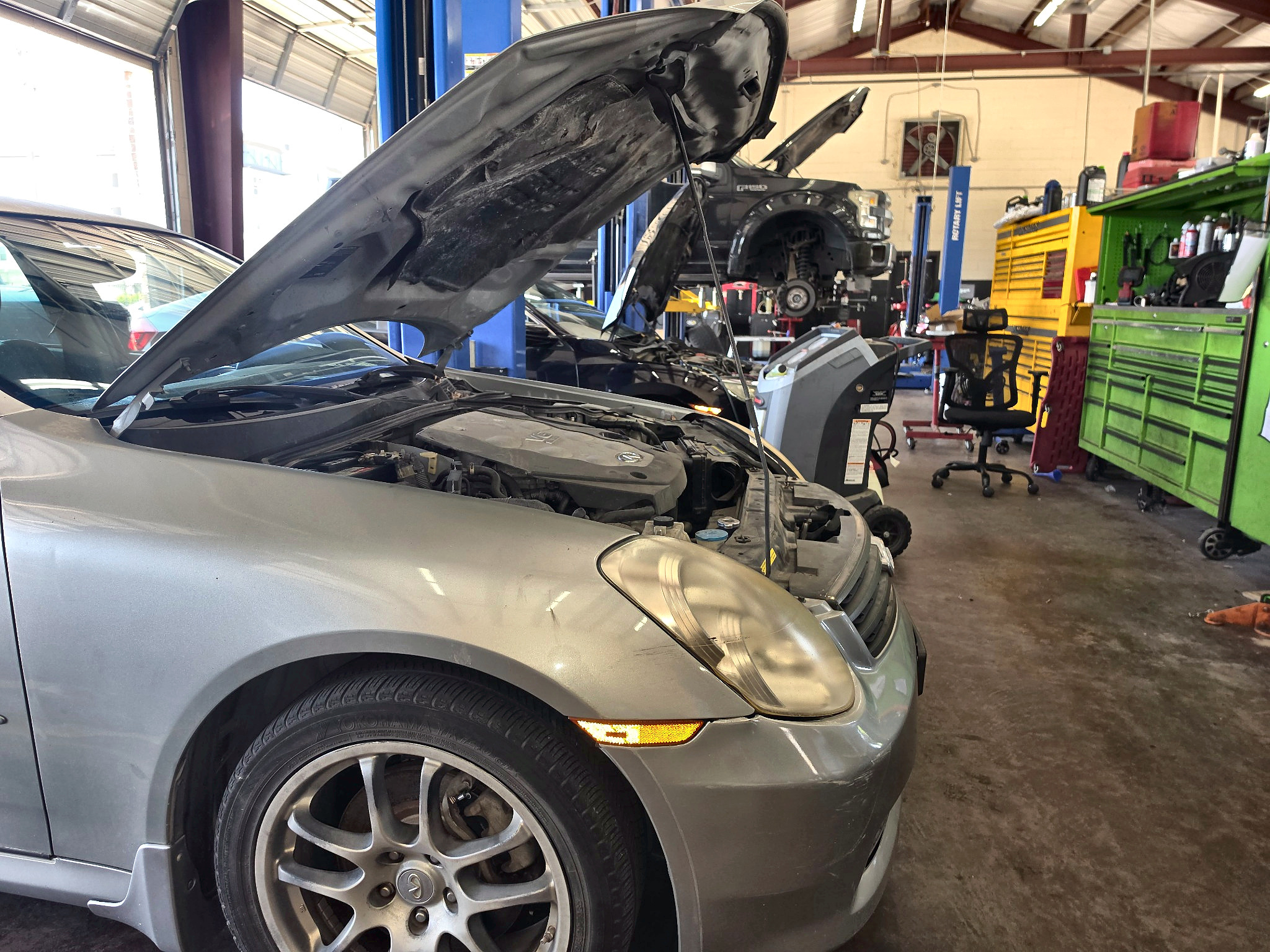 Vehicle diagnostic service in the shop at Auto Care USA in Katy, TX